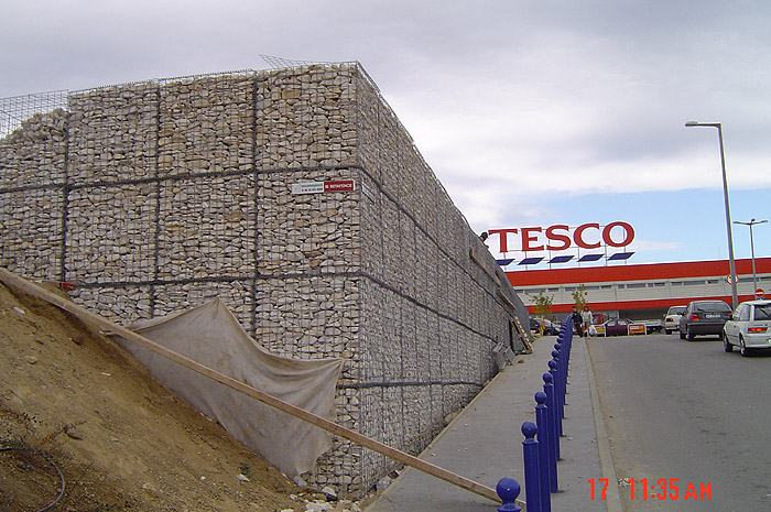 GABION retaining wall supporting car park at OPEL MAXABO Kft.